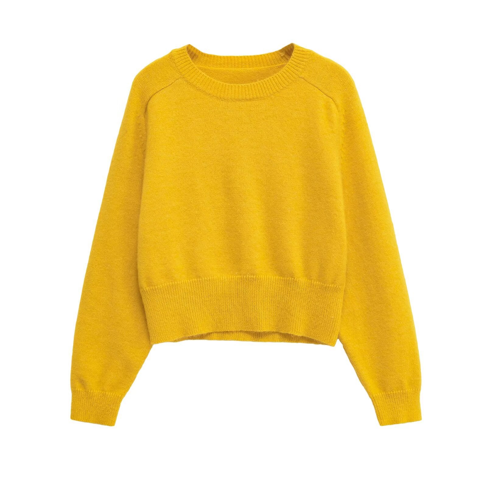 Pull en maille douce à col rond et manches longues.