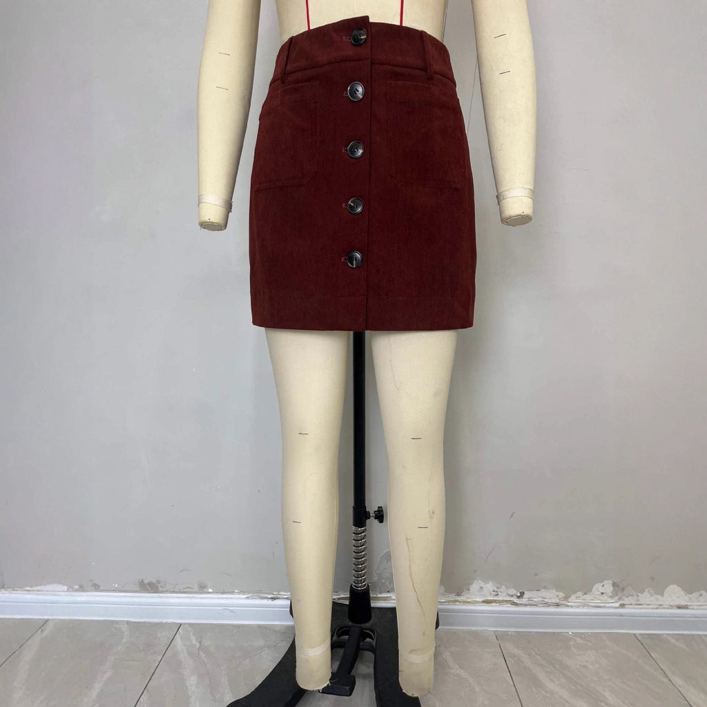 Jupe courte moulante à simple boutonnage