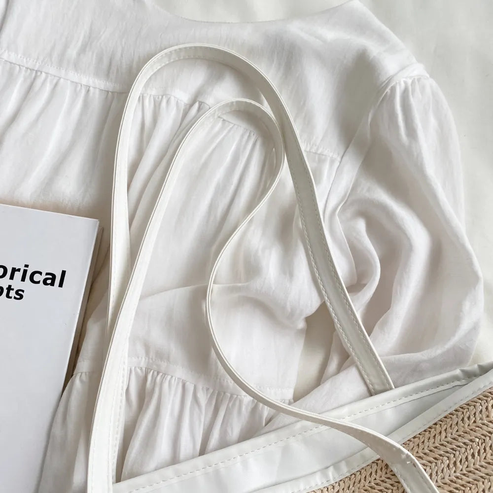 Sac cabas en paille tressée avec anses en cuir