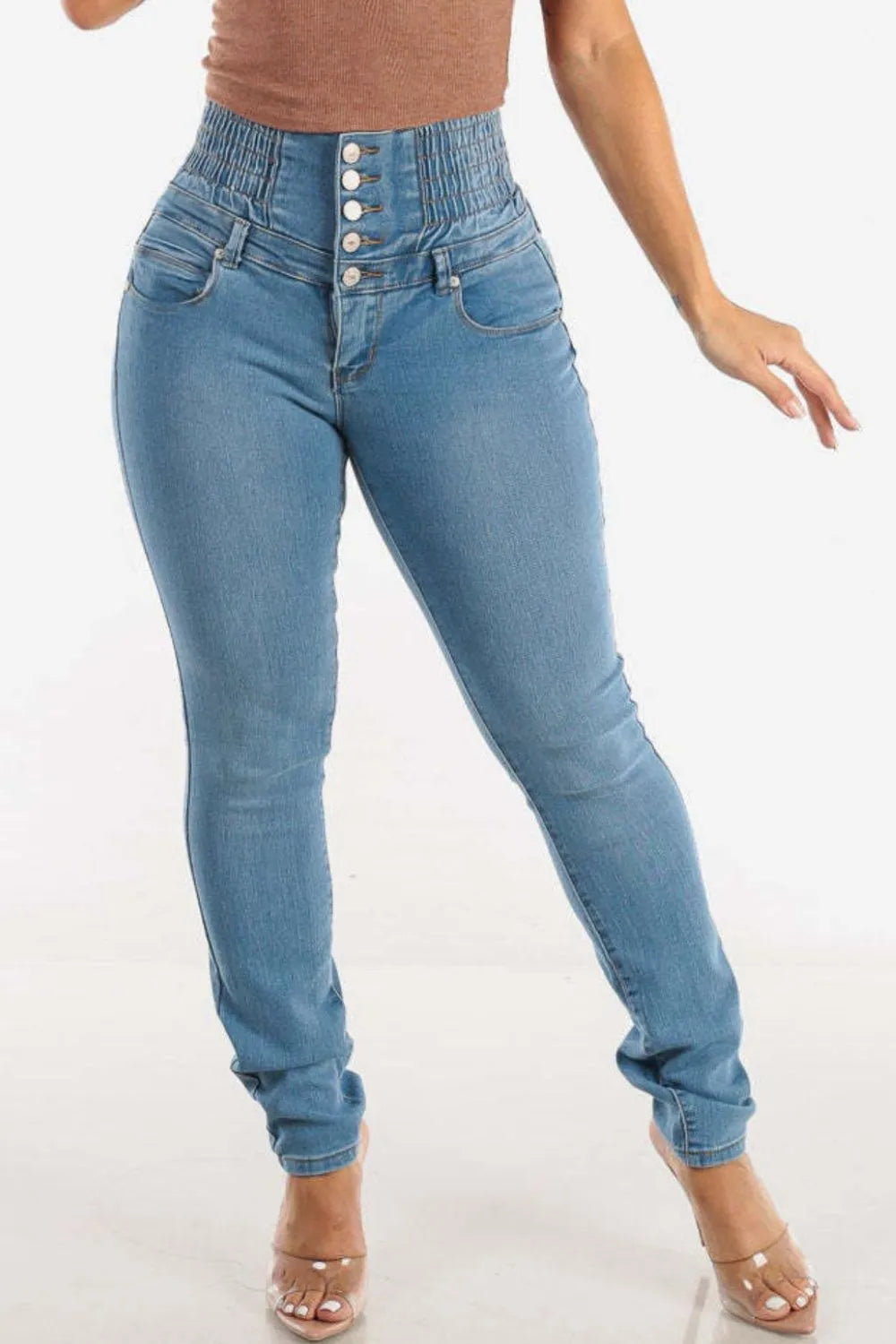 Jean skinny taille haute boutonné qui rehausse les hanches
