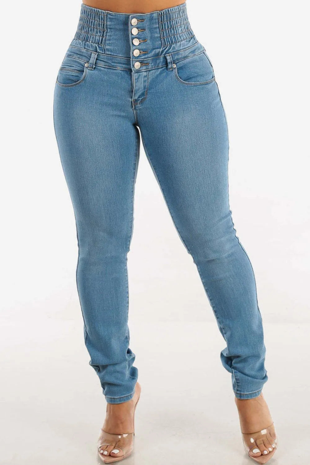 Jean skinny taille haute boutonné qui rehausse les hanches